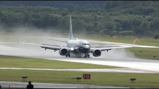 Boeing 737 MAX combat landing with spectacular reverse thrust on wet runway