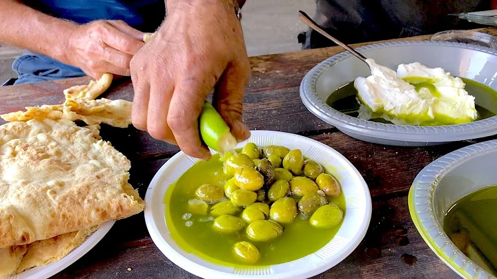 Pressing Fresh Olive Oil from the Press near Nazar...