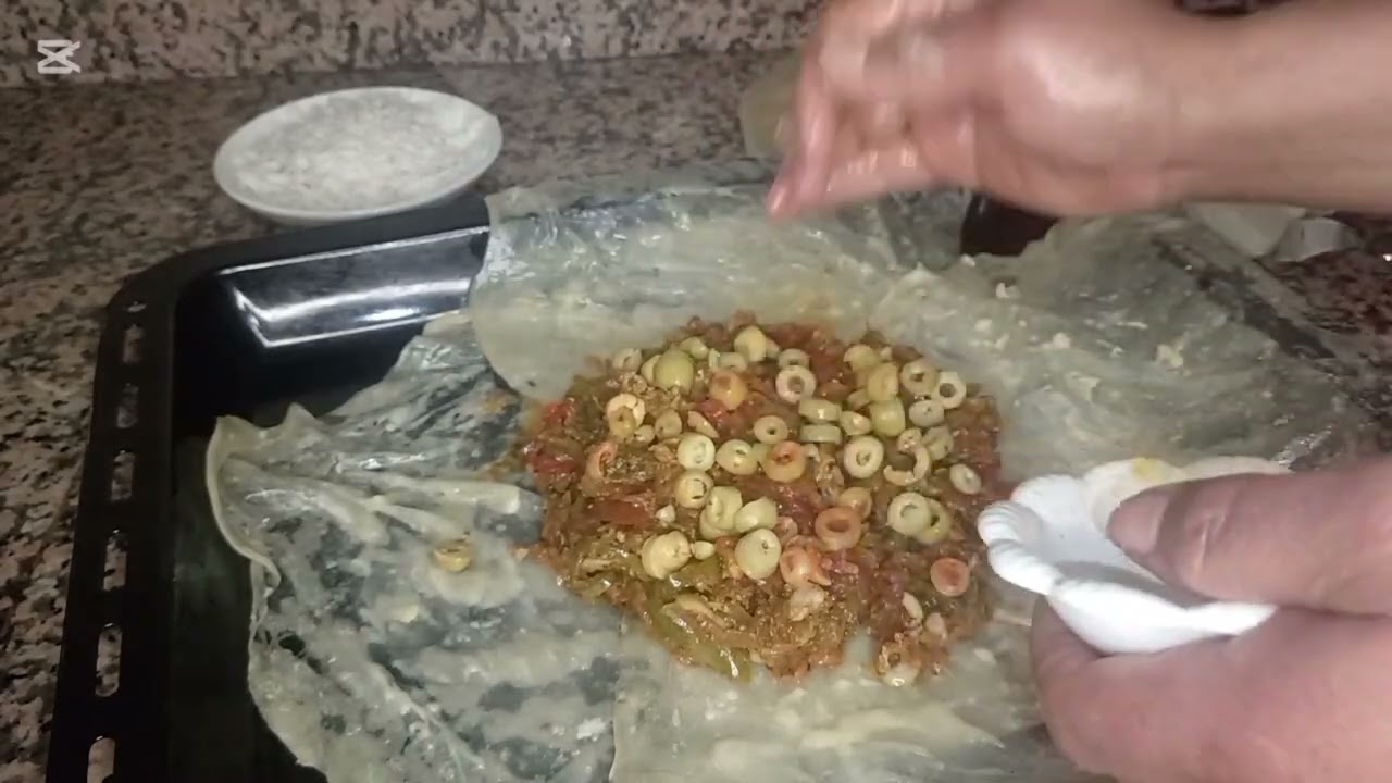 طريقة تحضير بسطيلة بعجينة المسمن بحشوة لذيذة ومذاق خيالي 👌