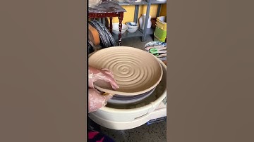 Wheel throwing a big plate