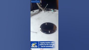 Capping machine with robotic arm for syringes #machine #cap #factory #bottlefillingmachine  #bottle