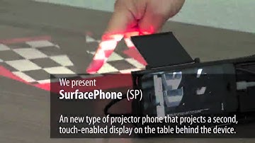 SurfacePhone: A Mobile Projection Device for Single- and Multiuser Everywhere Tabletop Interaction