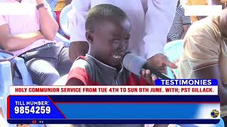 EMOTIONAL AS A YOUNG BOY CRIES WHILE TESTIFYING IN CHURCH.