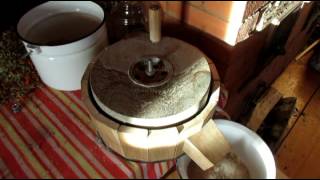 :     .    \ Hand mill in the mill stone. Overview