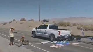 United States police officer gets fed up with climate protesters