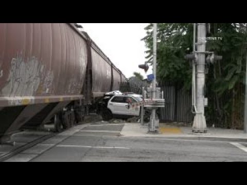 (CAUGHT ON CAMERA) LA County Sheriff Vehicle Hit By Train - YouTube