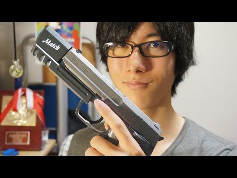 Does the Tokyo Marui Aircock USP come with a compensator
