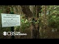 CBS News producer's mission to restore his family's cemetery reveals country's buried past