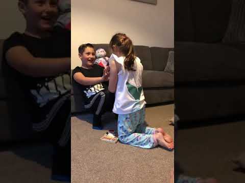 Little girl loses uno and makes brother fart