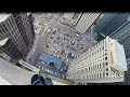 Rope access window cleaning 35 story building with rigging.