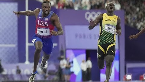 Noah Lyles wins 100m gold in photo finish separated by thousandths of a second