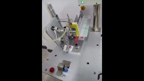 Labels Feeding & Tagging Machine