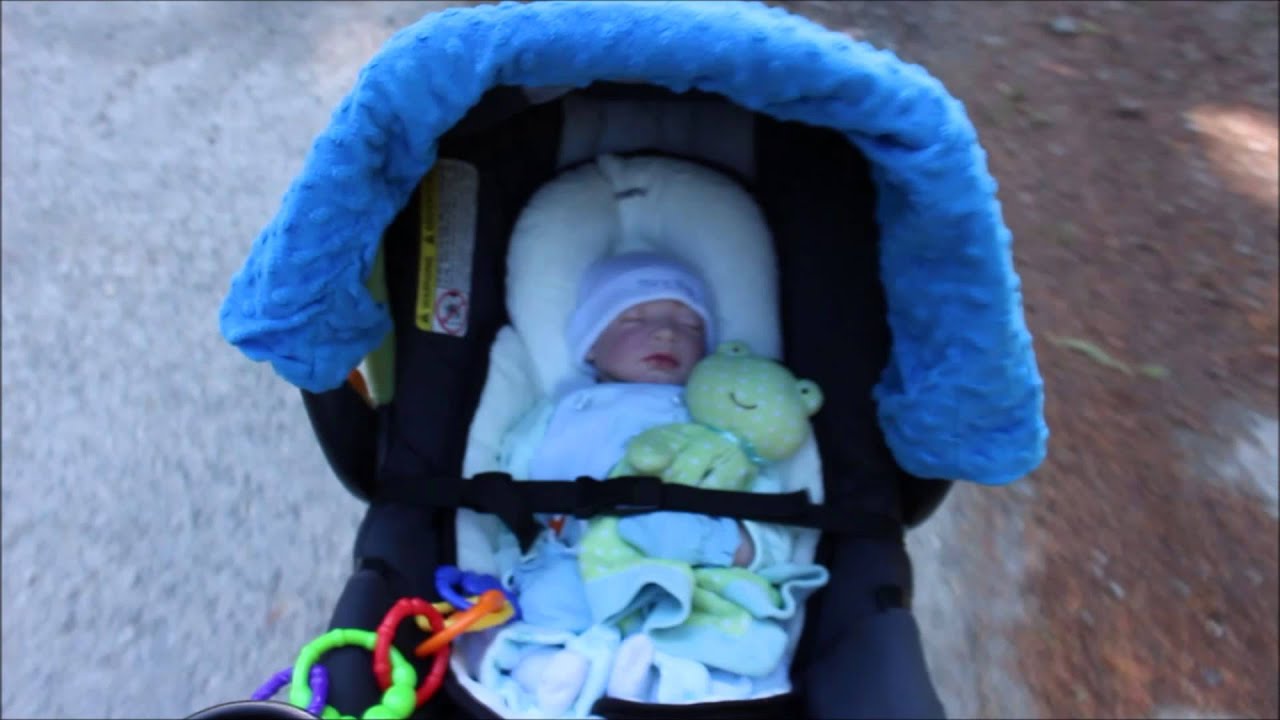 walking newborn in stroller