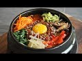 Bibimbap dolsot  riz lgumes et viande  mlanger dans un bol brlant  cooking with morgane