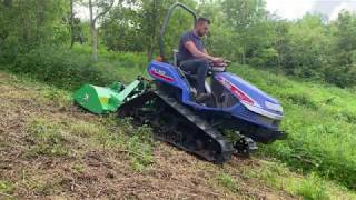 Cutting grass with ISEKI TPC183 Track tractor and flail mower