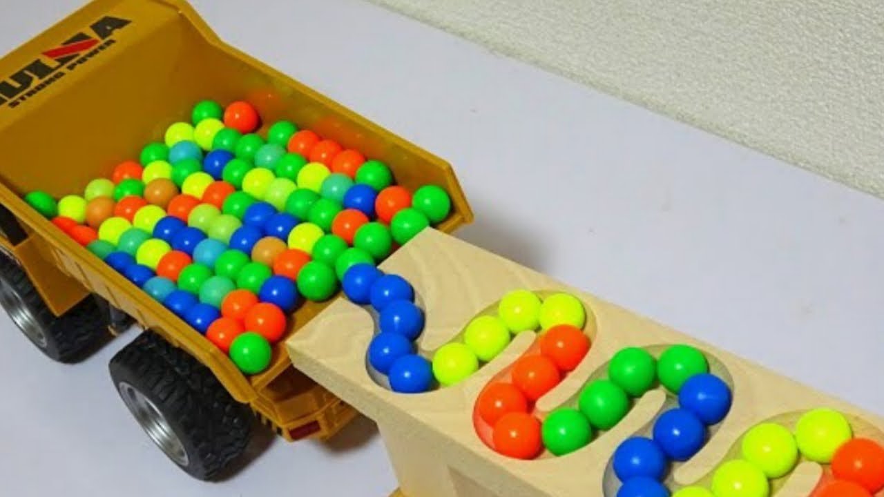 Marble Run Race - rain gutter - Haba wave Slope - Dumb Truck |