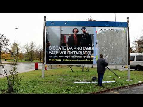 Installazione manifesti Anmic Parma - campagna di volontariato