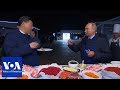 Putin and Xi make pancakes | VOANews