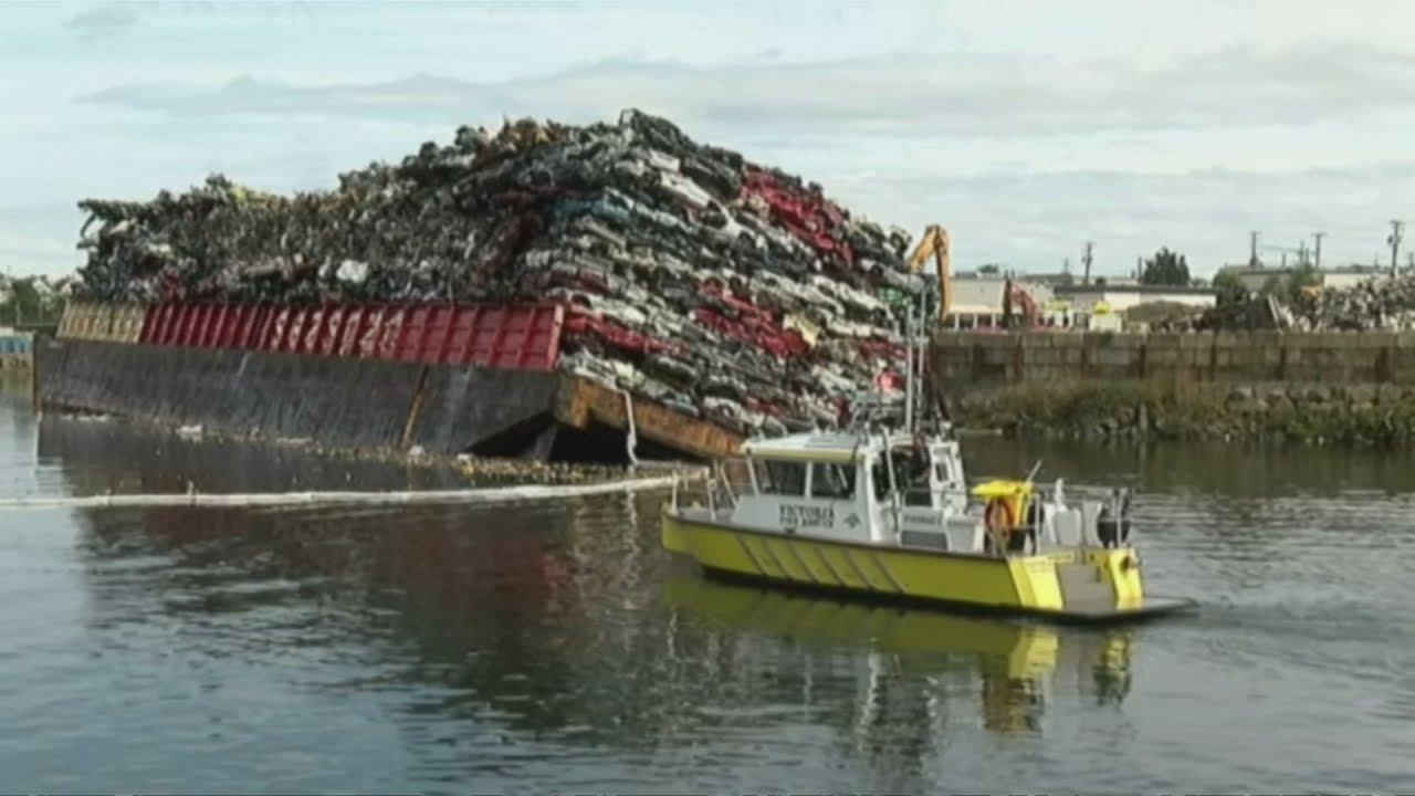 Barge Carrying Crushed Cars Sinks In Canada