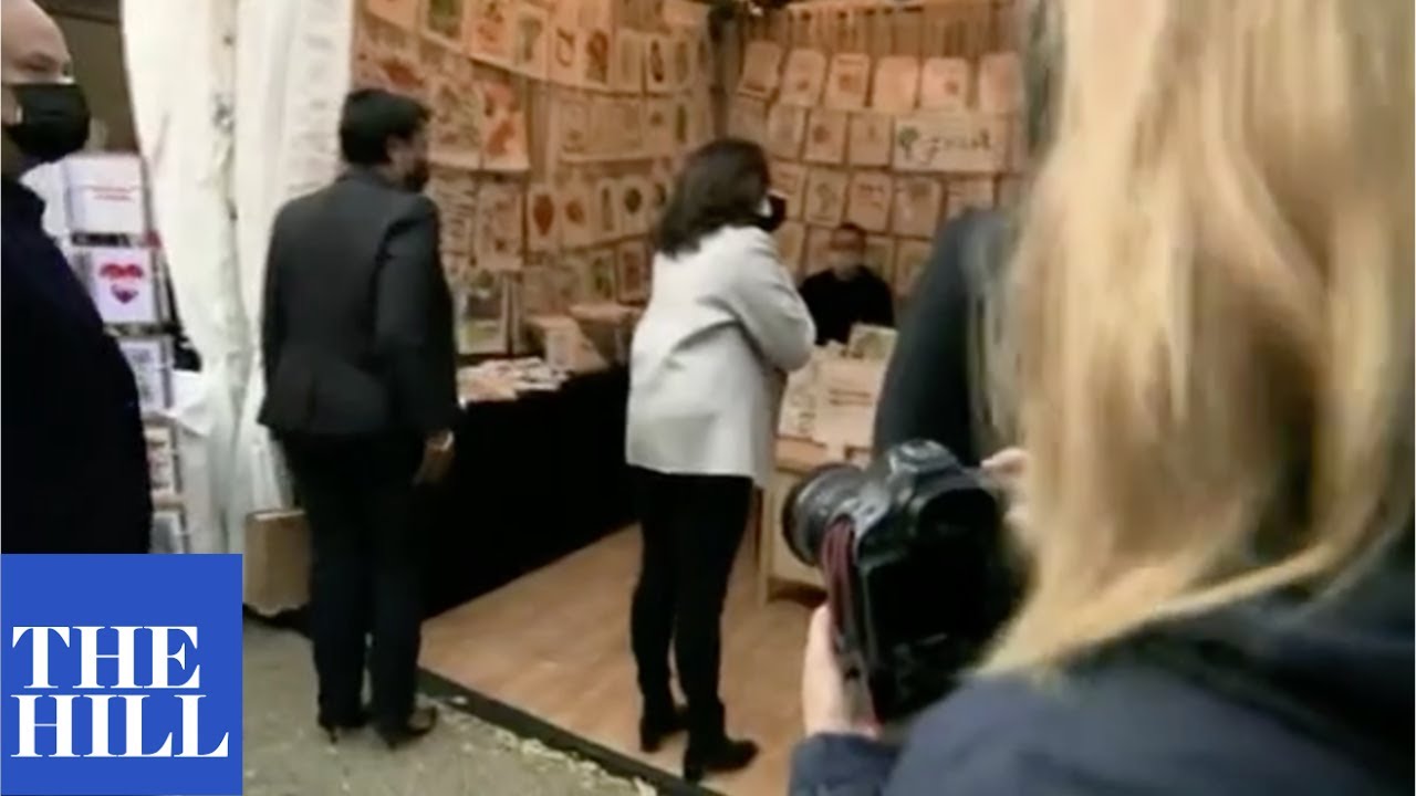 Vice President-elect Kamala Harris visits an outdoor market on Small Business Saturday
