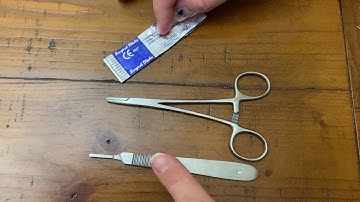 Loading scalpel blade