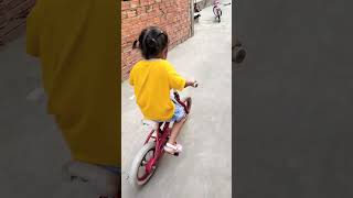 Nana learns to ride a bike