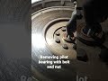 Removing pivot bearing (pilot bearing )from flywheel using bolt nut and screwdriver