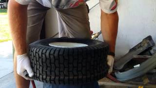 How to: Seating lawnmower tire bead using a 5 gallon bucket.