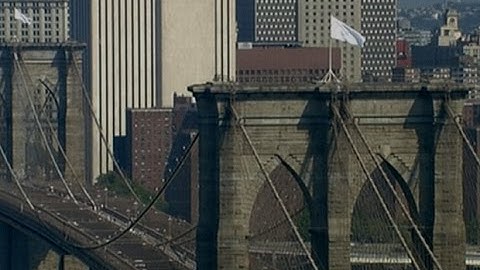 Brooklyn Bridge white flag mystery puzzles New Yorkers