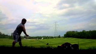 Getting Kicked off of the driving range for hitting the golf ball too far