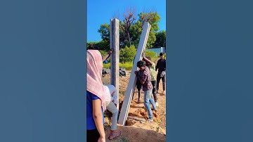 Precast RCC double columns are fixed by labour in this manner#precast#rccwall