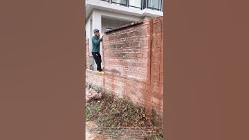 An efficient method for demolishing parts of a wall: cut it and then push it down!