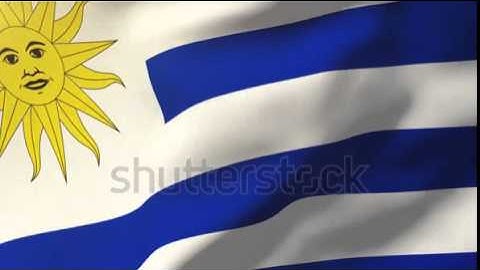 Uruguay flag waving in the wind. Looping sun rises style. Animation loop Stock video by