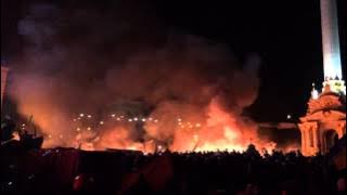 Ukrainian protesters sing the national anthem during clashes, Kyiv, Feb 18, 2014