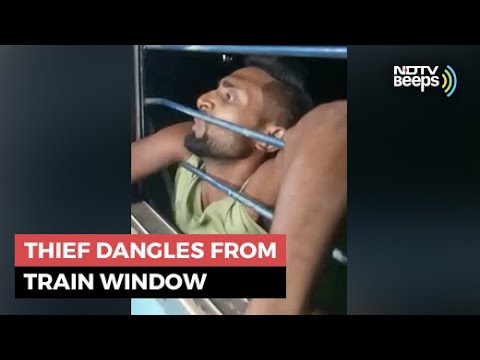 Watch: Thief Dangles From Train Window As Passengers Grab Arms | NDTV Beeps