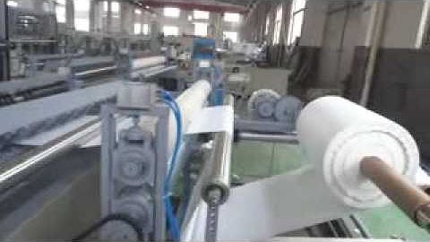 non woven perforating,slitting and rewinding  machine