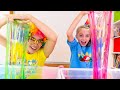 Alicia and Mom having fun making slime with funny balloons and glitter