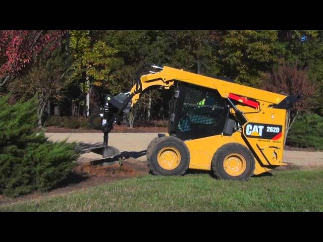 Cat® Auger Work Tool Attachment at Work - YouTube