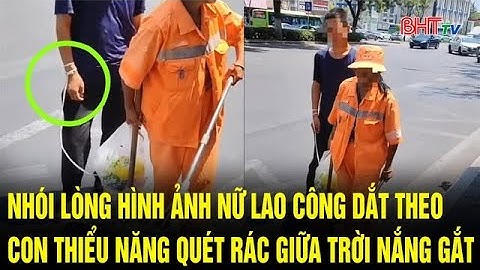 Nhói lòng hình ảnh nữ lao công dắt theo con thiểu năng quét rác giữa trời nắng gắt