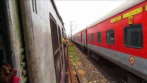 High speed Parallel race with Howrah rajdhani express and EMU