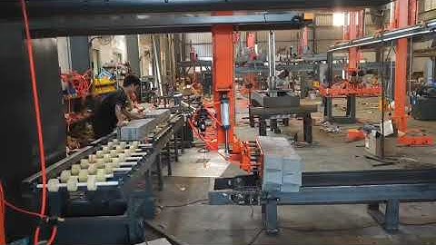 automatic loader and unloader for kerbs and tiles