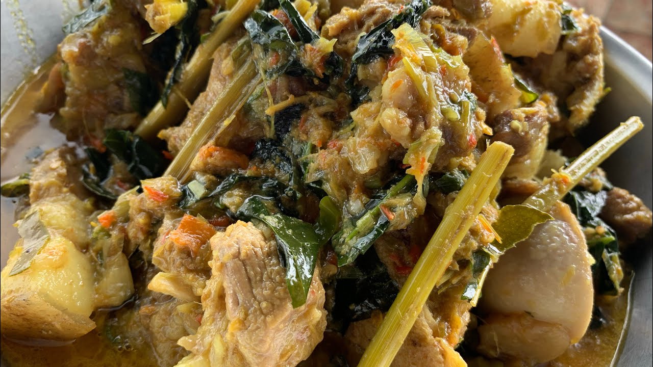 Memasak babi bumbu Rw