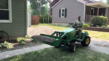 FEL moving river rock on JD x729