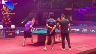 Coach Ma Lin demonstrates to Xu Xin how to receive a serve screenshot 4