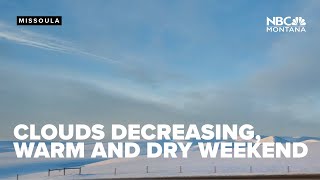 Clouds decreasing today; weekend warm and dry