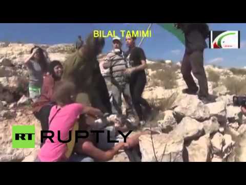 State of Palestine: Teenage girl stops IDF soldier attacking injured boy in West Bank