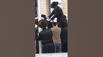 Thumbnail of Jewish Hasidic Jews dance in the streets of Israel