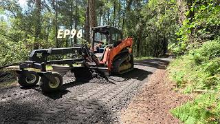 Skid steer grader resurfacing gravel driveway. Ditch cleaning and spreading new class 2 base EP96.