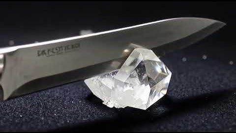 Super-sharp knife cuts through obsidian, quartz, sapphire, emerald, jade, and diamond in slow-mo.
