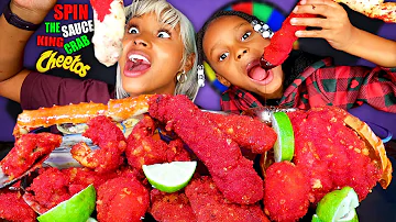 HOT CHEETOS KING CRAB LEGS SEAFOOD BOIL SPIN THE WHEEL CHALLENGE SEAFOOD MUKBANG QUEEN BEAST & LAYLA